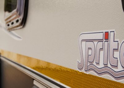 Close up of Sprite Caravan Logo
